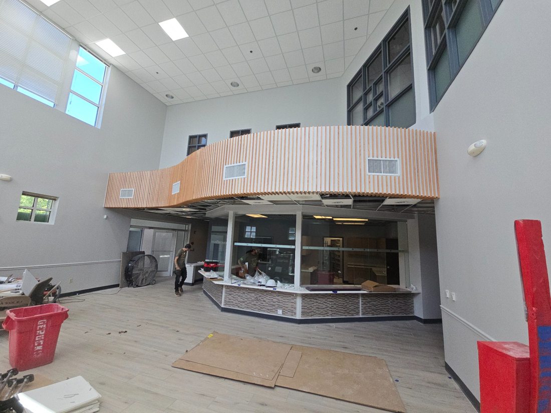 Curved commercial millwork installation
