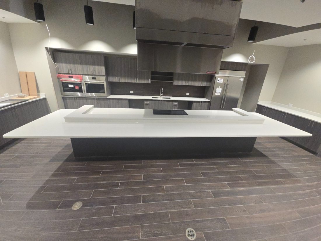 Commercial office casework and solid surface island